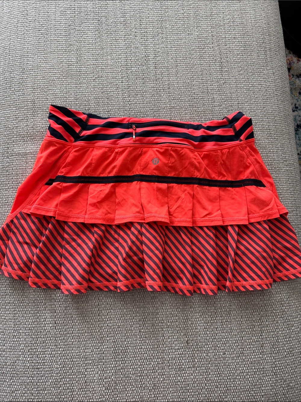 Lululemon neon orange/coral and navy skirt
